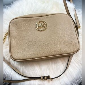 Michael Kors light tan bag, adjustable strap
